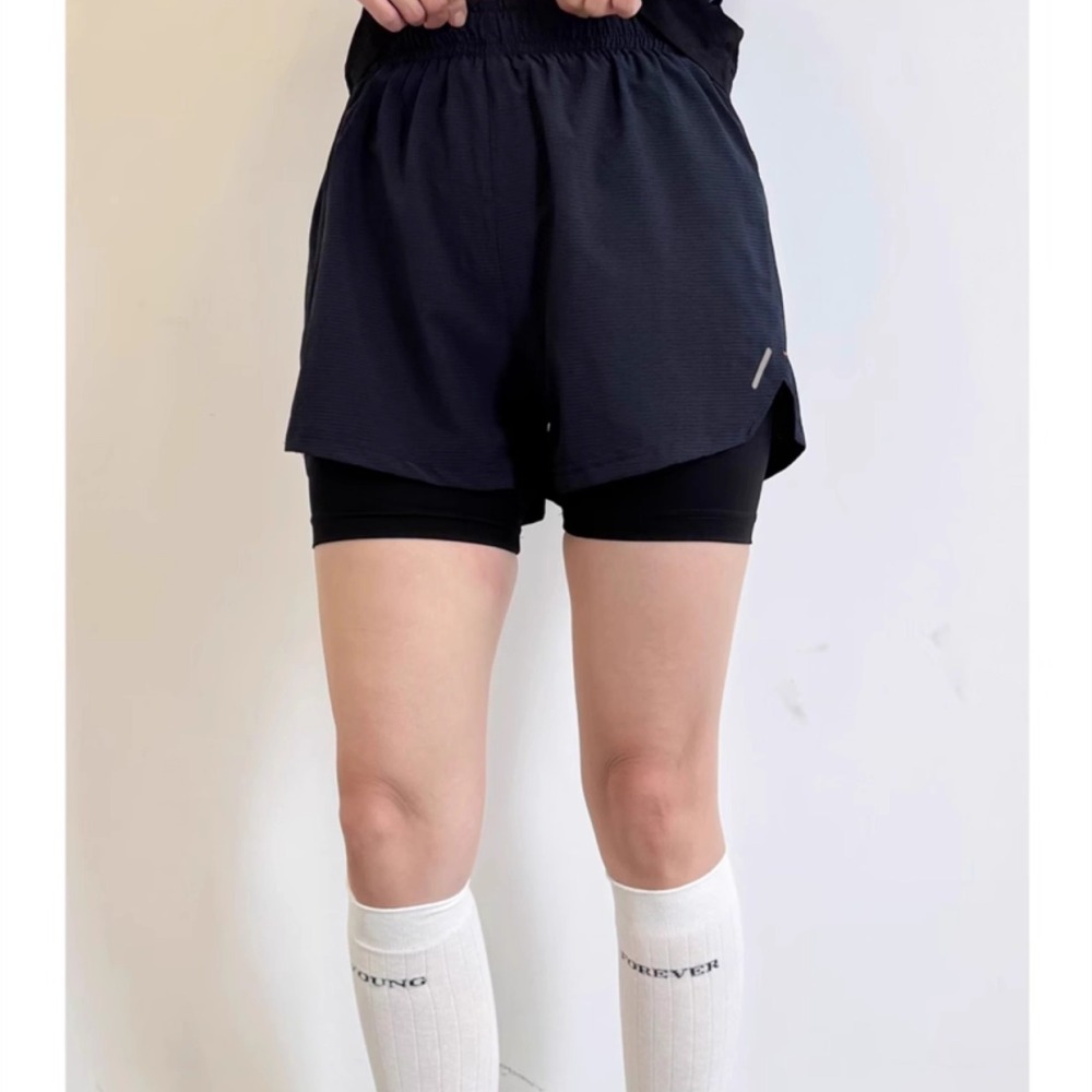 شورت رياضي نسائي 2 في 1 عالي ا - مراجعة Running Gear Junior وسعره